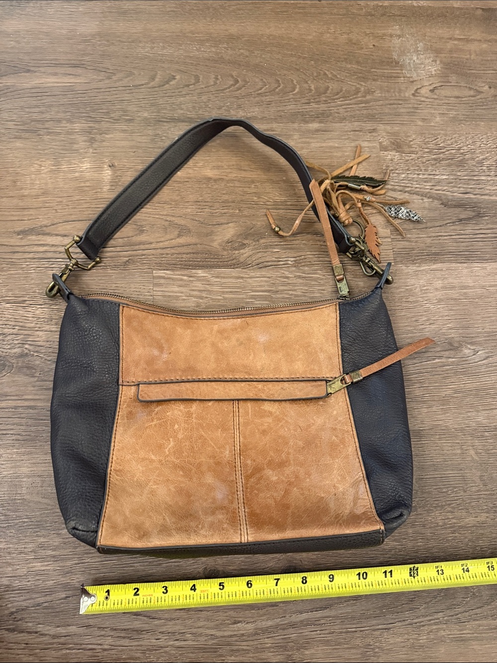 The Sak Two-Tone Brown & Black Leather Shoulder Bag with Tassel Charm Snake